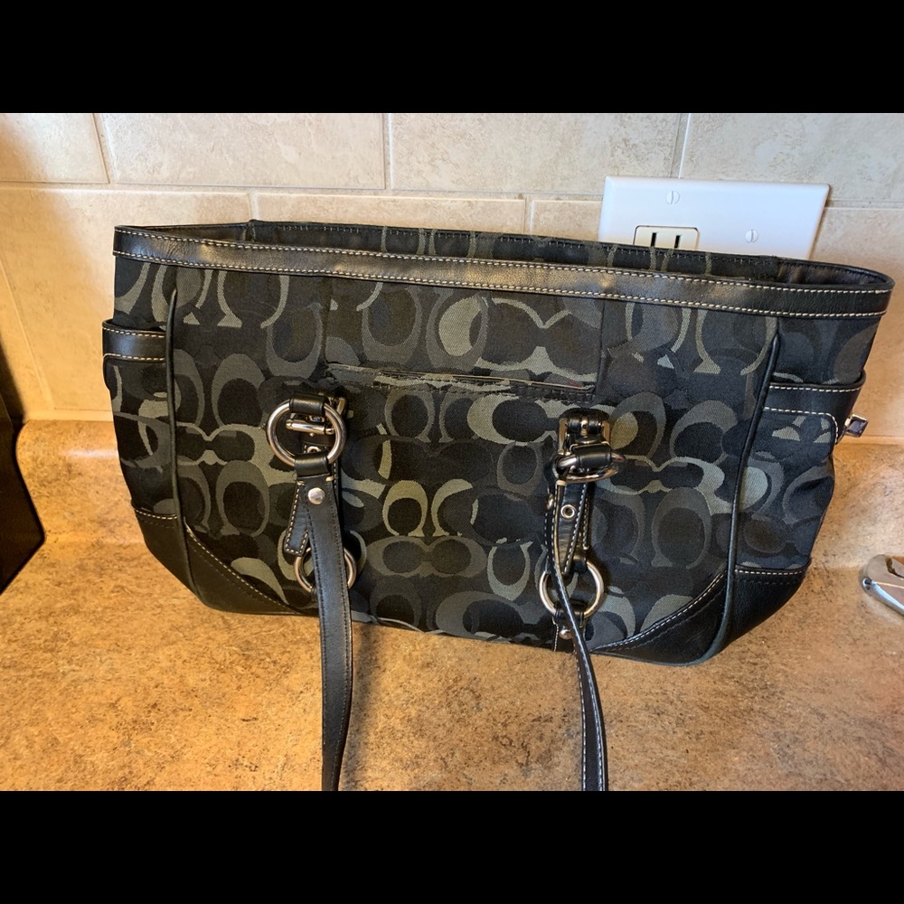 Black and grey coach bucket bag